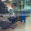 Large continuous mesh belt heat treating furnace