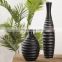 Factory direct wholesale cheap custom home decoration black matte resin vase for flowers