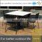 Garden treasure outdoor dining set with marble top table and rattan chairs