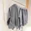 Suit collar belt loose sheepskin windbreaker spring and autumn genuine leather leather jacket for women wide version mid-length jacket