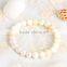 Wholesale Auspicious Buddhism style hand chain alloy horse with white pearl jewelry bead Giant clam bracelet