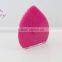 Red color exfoliating face brush skin cleaning device