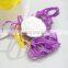 Girl's colorful rubber hairbands in plastic box