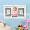 Adorable baby print set with wall frame
