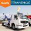Sinotruck howo heavy duty flatbed rotator tow truck wrecker wheel lift for sale with arm crane