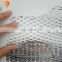 Compressed layer aluminum stretch wire mesh