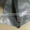 Sun and weather resistant reflective agricultural tarpaulin cover for greenhouses