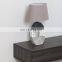 Modern art style grey and white base bedroom ceramic desk lamp for hotel