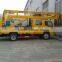 Combined folding arm and telescopic boom truck lift