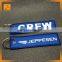 Popular design cheap embroidery custom logo key chain
