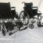 hospital elderly cerebral palsy height adjustable manual foldable wheelchair chair with wheels foot rest and nylon seat