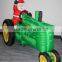 Christmas inflatable santa on farming tractor