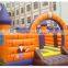 Children playing inflatable bouncing castle