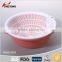 colorful round plastic kitchen fruit sieve with tray