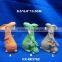 Ceramic Easter bunny with ribbon decoration and decorative ceramic rabbit figurines and ceramic rabbit figurines