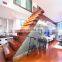 Tempered glass panel railing  wood steps stair  internal straight staircase