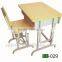 Adjustable wooden student desk and chair