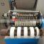 Automatic smoking paper slitting machine