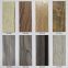 Foshan rubber spot supply wood grain PVC rubber floor stone plastic floor tile LVT floor waterproof vinyl base brick