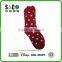 red fluffy socks with white dots pattern