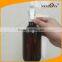 Empty 16oz Amber PET plastic trigger bottle with white trigger wholesale