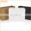 Orange paper bag with ribbon handle