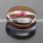 Coated reflector lens double convex