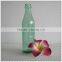 Green glass beer bottle