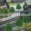 Architectural miniature plastic and iron wire model trees for model train scape layout