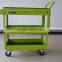 green tool trolley with handle and wheels