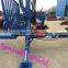 Wood loading trailer with crane
