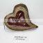 heart-shaped dark brown moss and sisal pot