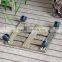 square wooden plant pot tray with four wheels