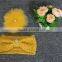 Factory directly wholesale price knitted yellow headband raccoon fur scarf with fur ball