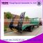 High quality 4x2 low bed trucks flat bed car for transport heavy duty machine or 20ft container for sale                        
                                                Quality Choice