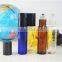 RUIJIA 4ml 6ml 8ml 10ml 1/3 oz clear amber blue pen glass roll on perfume glass bottle with stainless steel roller ball                        
                                                                                Supplier's Choice
