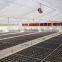 Plastic film agricultural greenhouse with equipment