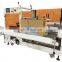 Automatic case packer robot arm biscuits cakes burgers foods carton box filling packing machine