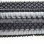 Increased friction flush grid modular belt with rubber