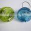 Colored glass bee catcher with handle