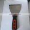 Scraper with TPR handle