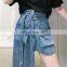 TWOTWINSTYLE Women Denim Skirt High Waist With Sashes Patchwork Loose Streetwear Asymmetrical