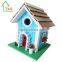 Hanging grey wooden The Little Barn bird house kit