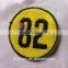 Gold color twill number embroidery patch with trim