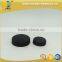 Amber vitamin pill glass bottle with lined black closure