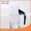glass wine decanter with colored glass handle and scale