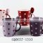 340cc stoneware gift coffee mugs with dot and spoon in hand
