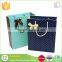 recyclable custom cheap foldable shopping paper garment packaging bag with handle