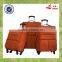 Orange Color Real Push Trolley 4 Wheels TSA Lock  China Wholesale Aluminum Trolley Cases