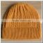 Cashmere knitted cable with fur ball hat